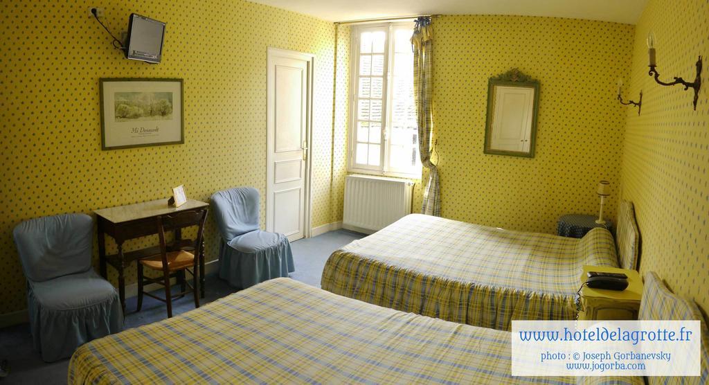 Hotel De La Grotte Монтіньяк Номер фото